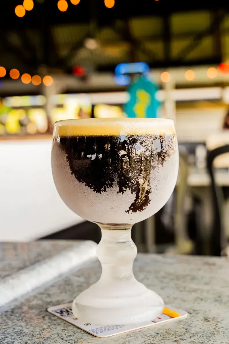 Frosted schooner of dark beer in the Harbor House dining room