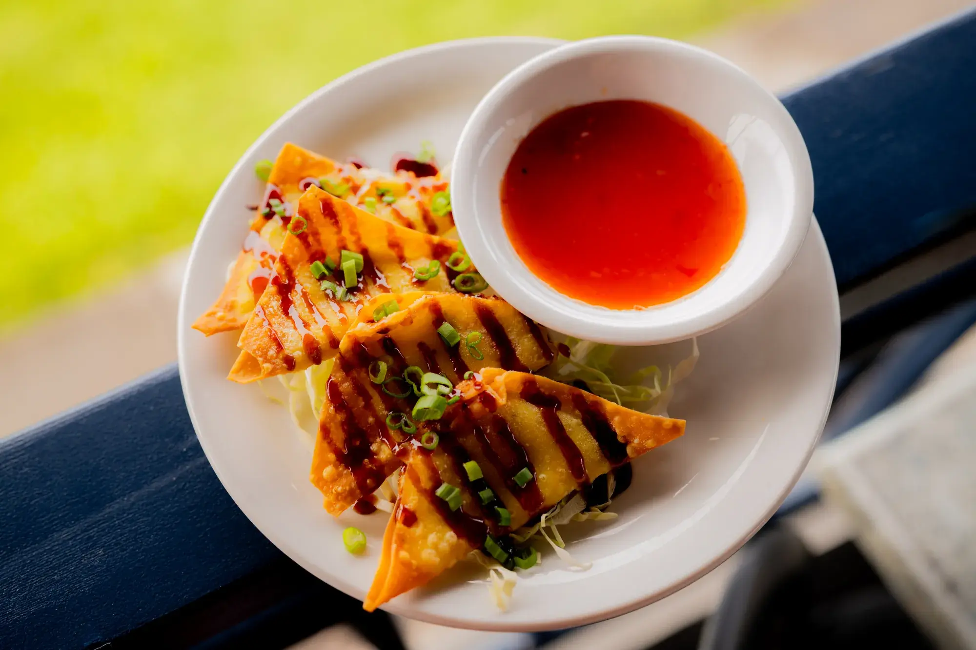 Crab Stuffed Wonton (4) at Harbor House Kona, Sweet chili sauce, kabayaki sauce.
